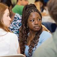 2 female students in a group